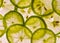 Juicy slices of tropical lemon fruit harvest back lit transparent