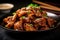Juicy and succulent chicken teriyaki in a dark, glossy sauce, garnished with sesame seeds and green onions