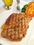 Juicy tasty beef steak meat dinner meal Table Restaurant Bangkok Thailand