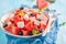 Juicy watermelon salad with feta, olives and mint leaves