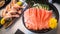 Juicy yummy tasty delicious freshness traditional Japanese style food raw seafood sliced salmon fish sashimi on ice in bowl