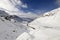 Julier pass road climbing among snow, Switzerland