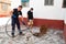 July 13, 2020. Granada. Spain: Workers cleans the drains hatch and removes dirt and debris from the sewer. Plumbers