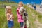 July 17, 2016 - Little girl holds sheep on Hastings Mesa near Ridgway, Colorado from truck
