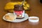 July 18th, 2017, Cork, Ireland - Nutella jar and a slice of homemade break with healthy fruits
