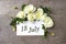 July 18th. Day 18 of month, Calendar date. White roses border on pastel grey background with calendar date. Summer month, day of