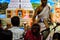 July 2018, Durgapur, West Bengal, India. Devotees clicking photos of a Purohit Panda at Rath Yatra Festival during Night. Rath Yat