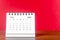 The July 2023 desk calendar for 2023 year on Red color background