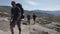 July 26, 2019. Norway tourist route on the trolltunga. People tourists go hiking in the mountains of Norway in fine