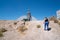 JULY 4 2018 - RACHEL, NV: Adult female walks toward an alien statue. Concept for alien abduction