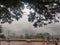 July 6, 2019- Karnataka, India: A landscape view of Raja`s Seat park filled with fog in Coorg, Karnataka, India. People spectatin