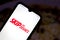 July 7, 2020, Brazil. In this photo illustration the SkipTheDishes Restaurant Services logo seen displayed on a smartphone