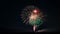 July party ignites vibrant firework display, illuminating dark night sky generative AI