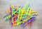 Jumbled pile of colorful plastic straws