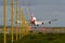 Jumbo jet airliner landing at airport