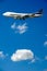 Jumbo plane and clouds