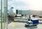 Jumbo Plane Head. Big passenger plane at gate at the airport front view. Sunny cloudy day.