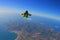 Jump. Free fall in open air. Sky jump like a hobby of extreme people. Flying men make professional jump. Skydiver in