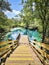 Jump platform over the aqua spring waters surrounded by lush forest, Royal Springs, County Park, Florida