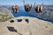 Jumpers on Preikestolen rock. Norway landmark. Astonishing photo