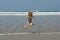 Jumping child on the beach