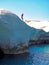 Jumping from the cliff near Sarakiniko Beach in Milos in the Cyclades Islands of Greece