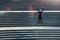 Jumping her way to a better life. Full length shot of an attractive young sportswoman doing jumping jacks on outside