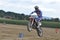 Jumping motocross driver