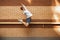 Jumping young man in front of buildings, on the run in jump high