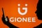 June 13, 2023, Brazil. Gionee logo is seen in the background of a silhouetted woman holding a