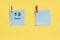 June 13st . Day of 13 month, calendar date. Two blue sheets for writing on a yellow background. Top view, copy space. Summer month
