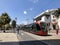 June 14, 2019 Casablanca Morocco. The Moroccan lady walk along the track, while the Tram is approaching.