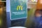 June 2021 Parma, Italy: McDonald`s logo icon on table reservation sign close-up. Fast food brand. Put it on the table, We``ll serv