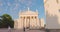 JUNE 25, 2022: Vilnius Cathedral Basilica with tourists walking in the streets