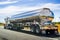 June 28, 2019 Tracy / CA / USA - Tanker truck driving on the freeway, the road and sky reflected in its shiny cistern