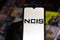 June 29, 2020, Brazil. In this photo illustration the Naval Criminal Investigative Service NCIS logo seen displayed on a
