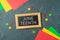 Juneteenth freedom day background with colorful paper, blackboard sign and stars. Top view, flat lay