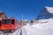 Jungfrau railway train station at Kleine Scheidegg to Jungfraujoch, north face of mount Eiger in background, Switzerland