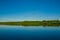 Jungle reflected in a lake in Limoncocha National Park in the Amazon rainforest in Ecuador