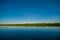 Jungle reflected in a lake in Limoncocha National Park in the Amazon rainforest in Ecuador