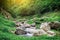 Jungle waterfall soft water of the stream in the natural park, B