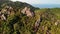 Jungles and mountains of tropical island. Drone view of green jungles and huge boulders on volcanic rocky terrain of Koh