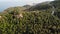 Jungles and mountains of tropical island. Drone view of green jungles and huge boulders on volcanic rocky terrain of Koh