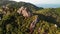 Jungles and mountains of tropical island. Drone view of green jungles and huge boulders on volcanic rocky terrain of Koh