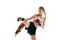 Junior female MMA fighter in sports uniform and gloves training isolated on white background. Concept of sport