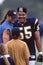 Junior Seau and Lorenzo Lamas