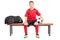 Junior soccer player sitting on a bench