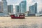 Junk boat for sunshine cruise passes the Miami skyline with skyscraper and scenic view