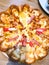 Junk food is pizza with cheese, ham Crab sticks and shrimp.pizza with Pineapple, Ham Slice, Crab Sticks, Mozzarella Cheese,