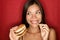 Junk food woman eating burger